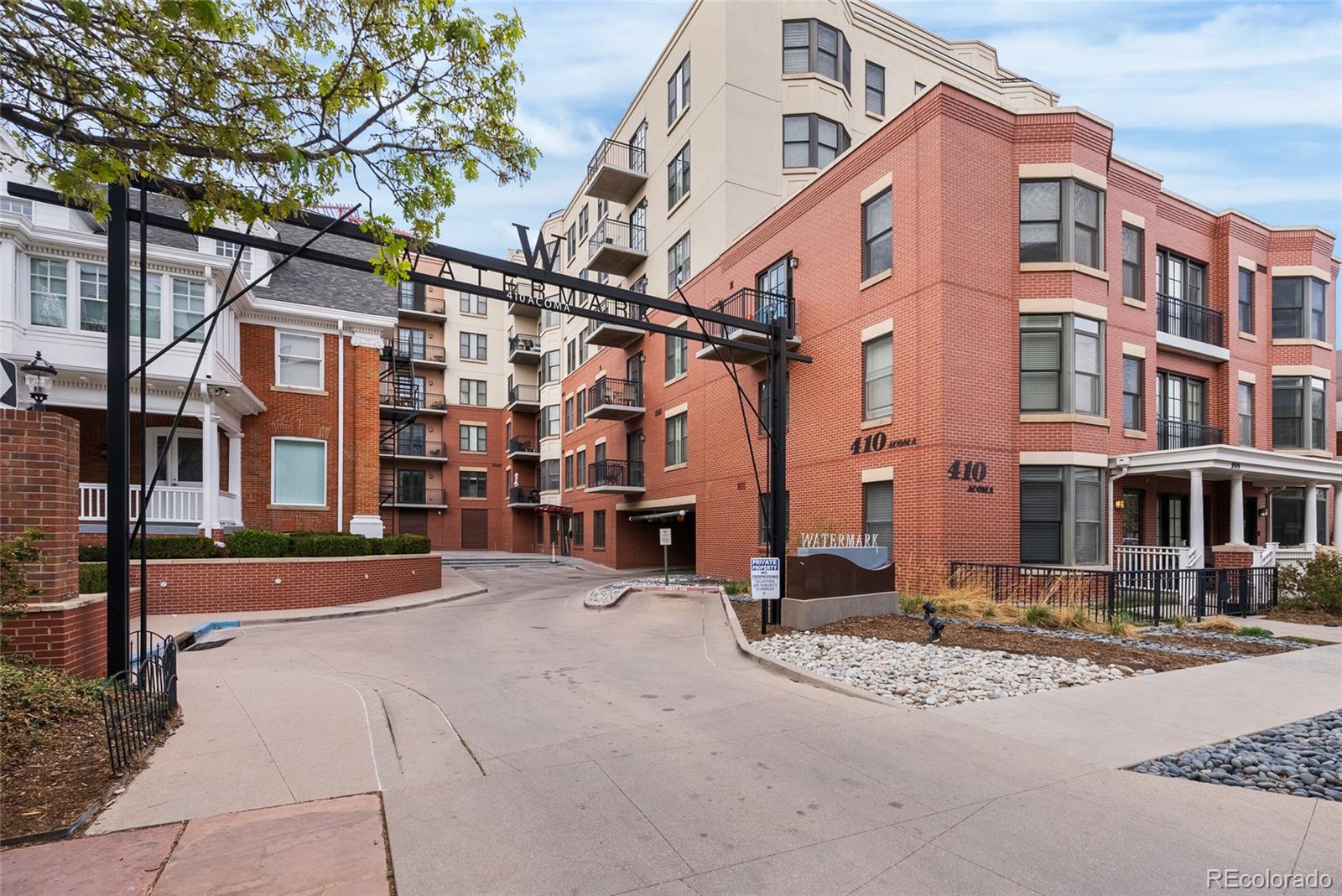 410 Acoma Street, Unit 511 Denver, CO 80204 - Photo 2 of 27 a front view of a building with street view