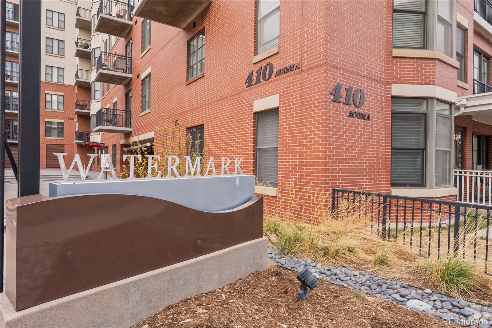 410 Acoma Street, Unit 511 Denver, CO 80204 - Photo 22 of 27 a view of a building with a outdoor space