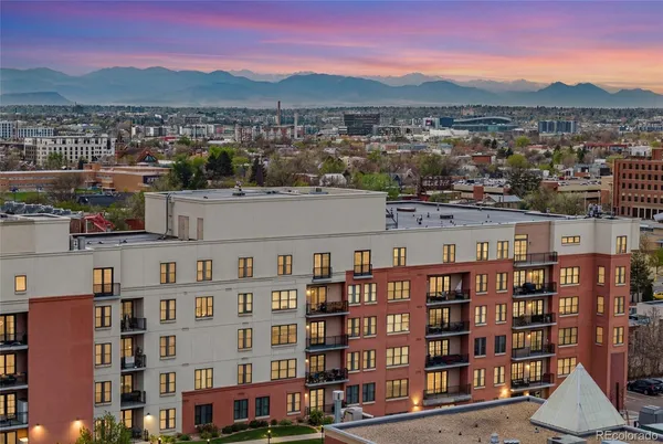 a view of a city with tall buildings