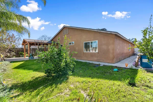 a house view with a garden space