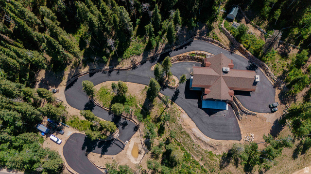 1667 West Tollgate Cyn Road Coalville, UT 84017 - Photo 3 of 61 New construction residence featuring a multi-gabled roofline and extensive surrounding woodlands