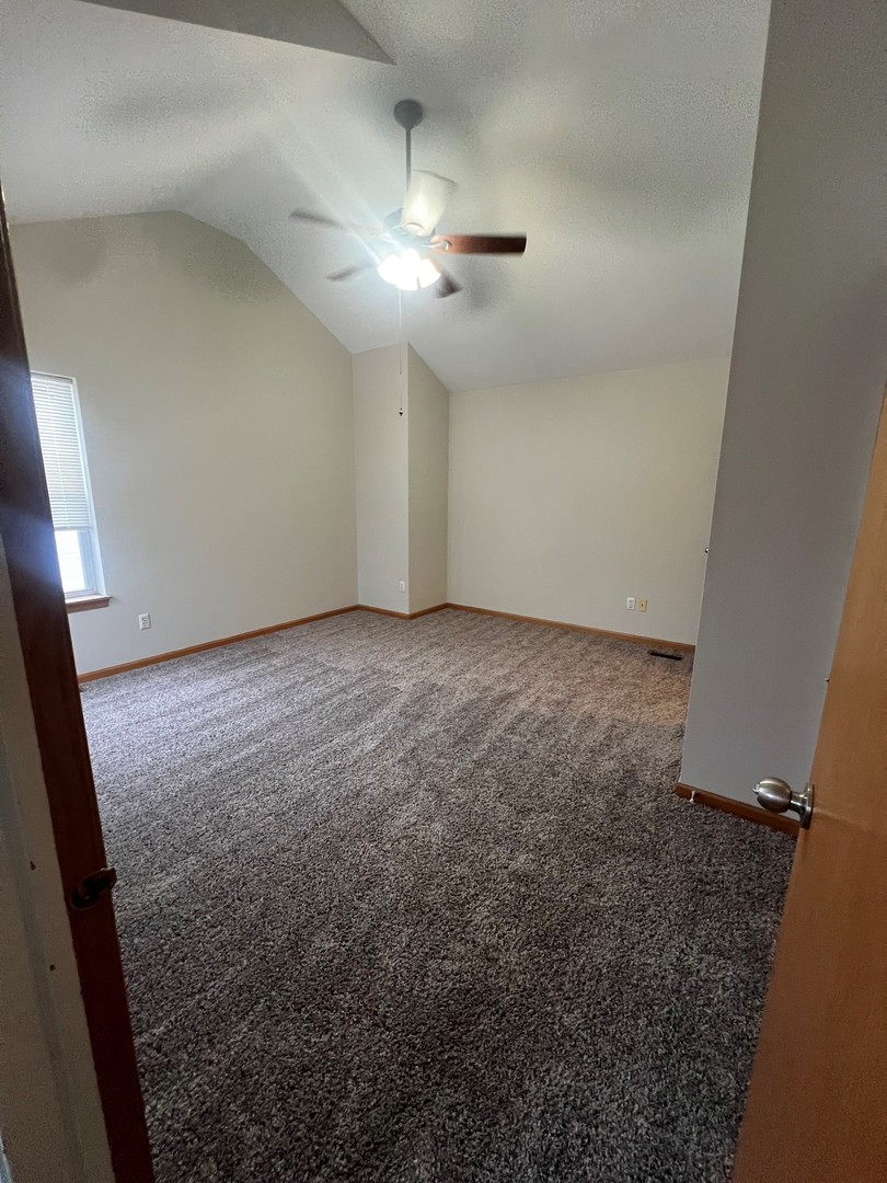 655 Nichole Lane Geneva, IL 60134 - Photo 8 of 11 wooden floor in an empty room