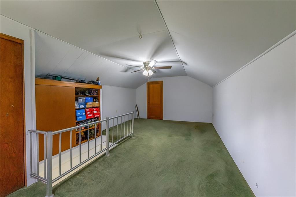 1470 Old Leechburg Road Pittsburgh, PA 15239 - Photo 15 of 25 a view of a hallway with a projector