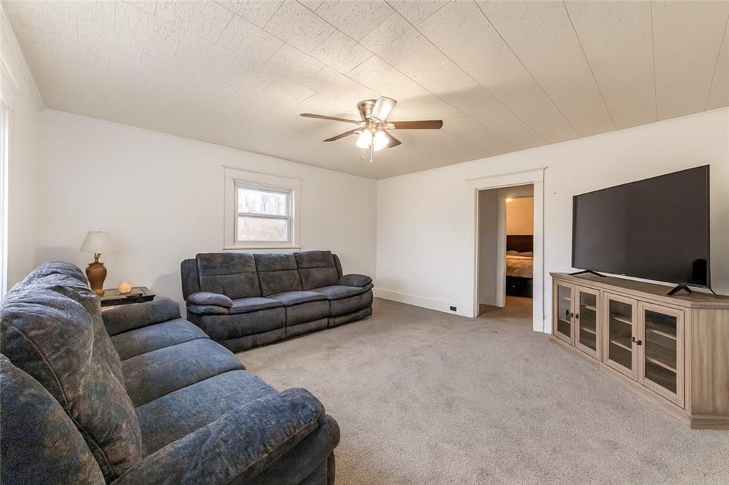 1470 Old Leechburg Road Pittsburgh, PA 15239 - Photo 3 of 25 a living room with furniture and a flat screen tv