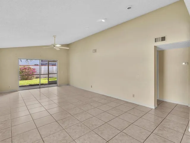 a bathroom with a sink a mirror and window