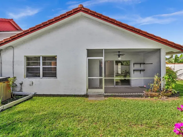 a bathroom with a sink toilet and mirror