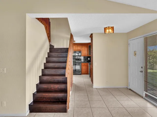 a view of a porch and garden