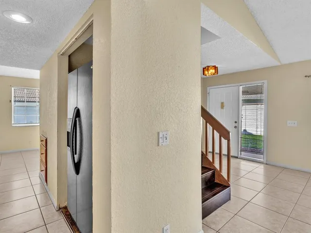 a view of an entryway with stairs