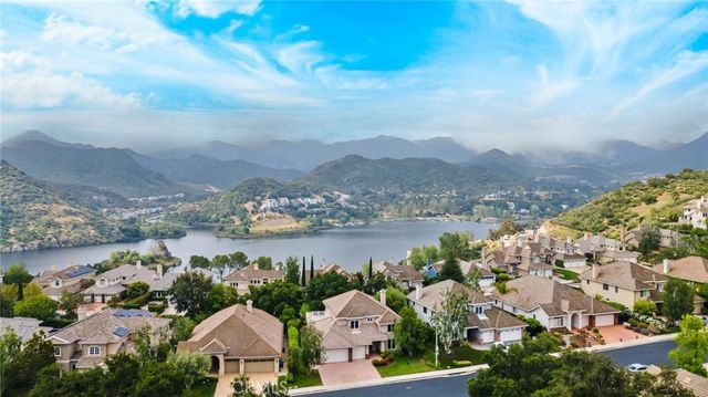 a view of a lake with a mountain in the background