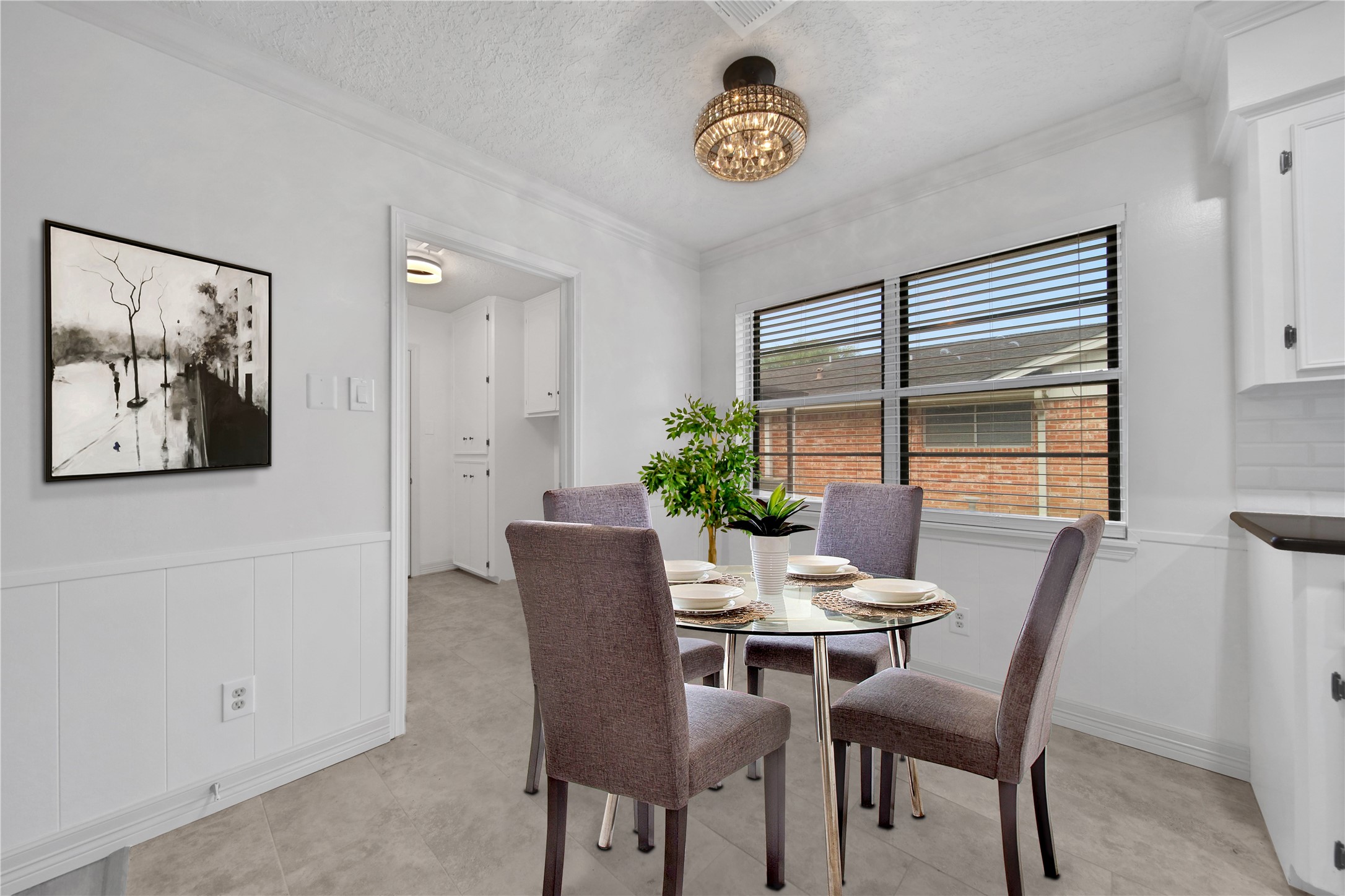 9411 Roos Road Houston, TX 77036 - Photo 20 of 41 a view of a dining room with furniture and window