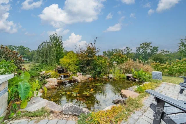 a view of a lake with a yard