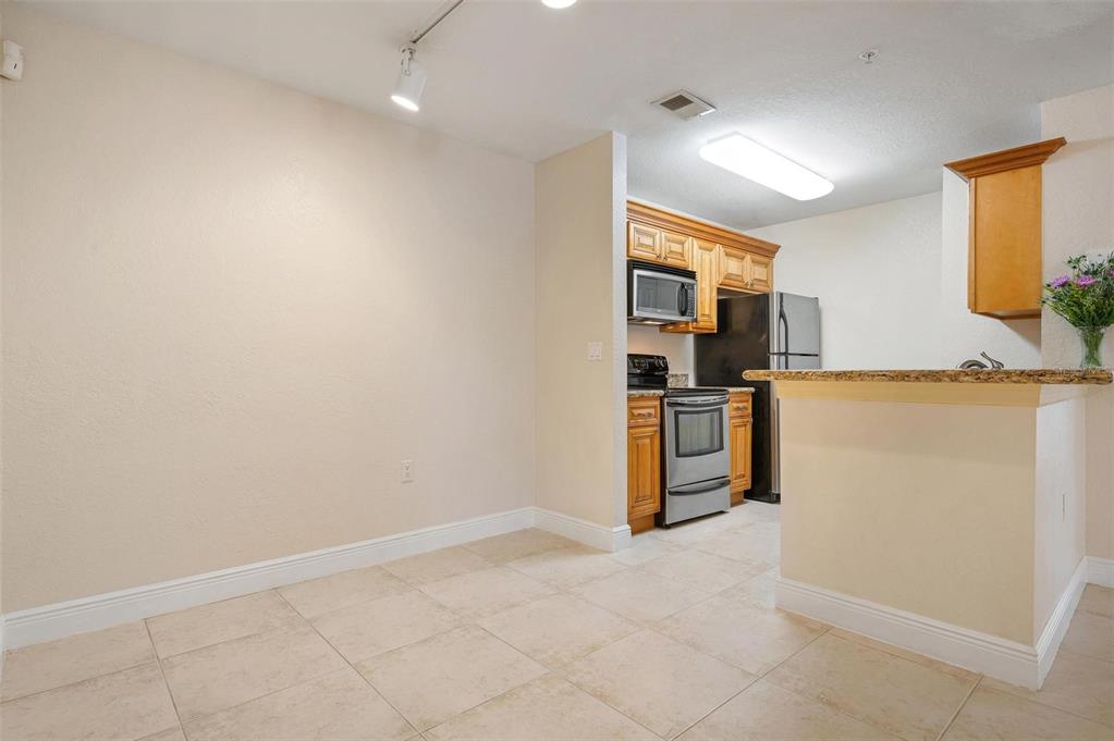 8933 Manor Loop, Unit 102 Lakewood Ranch, FL 34202 - Photo 23 of 68 Dinette