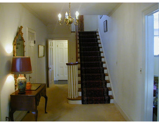 23 Old Colony Road Weston, MA 02493 - Photo 6 of 8 a view of entryway and hall with wooden floor