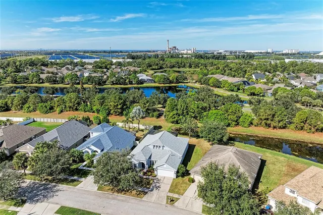 an aerial view of residential house with outdoor space