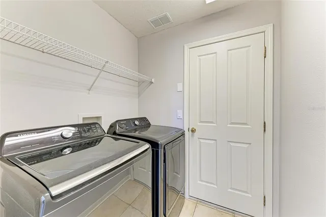 a view of a backyard with a swimming pool