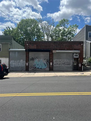 front view of a house with a street