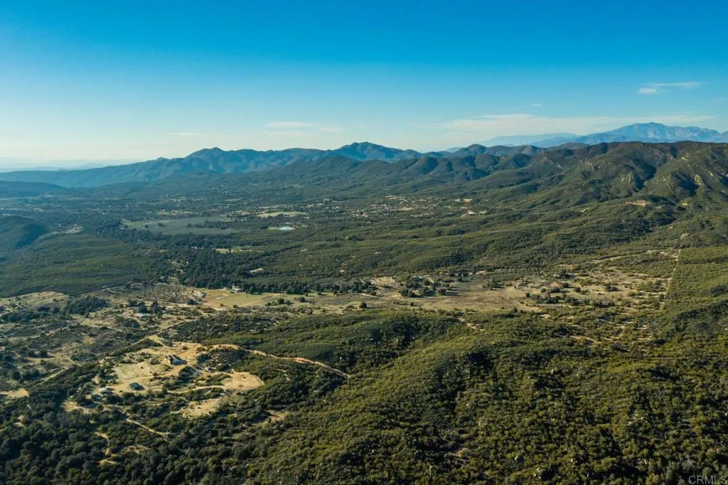 0 Chihuahua Valley Road Warner Springs, CA 92086 - Photo 3 of 7 a view of a lush green forest with mountains in the background