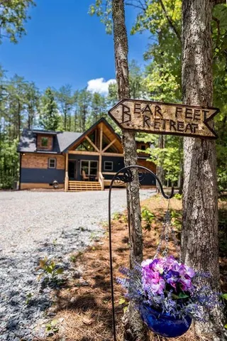 a view of a two chairs in the balcony