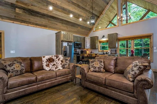 a sign that is sitting in front of a house