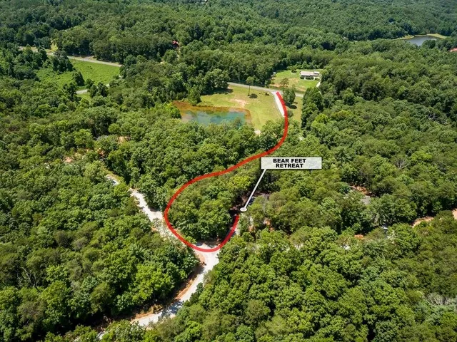 a view of an outdoor sitting area with swimming pool