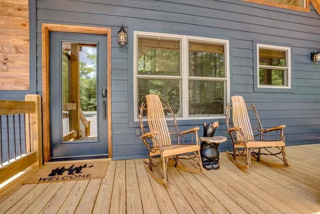 a outdoor living space with furniture and a fireplace