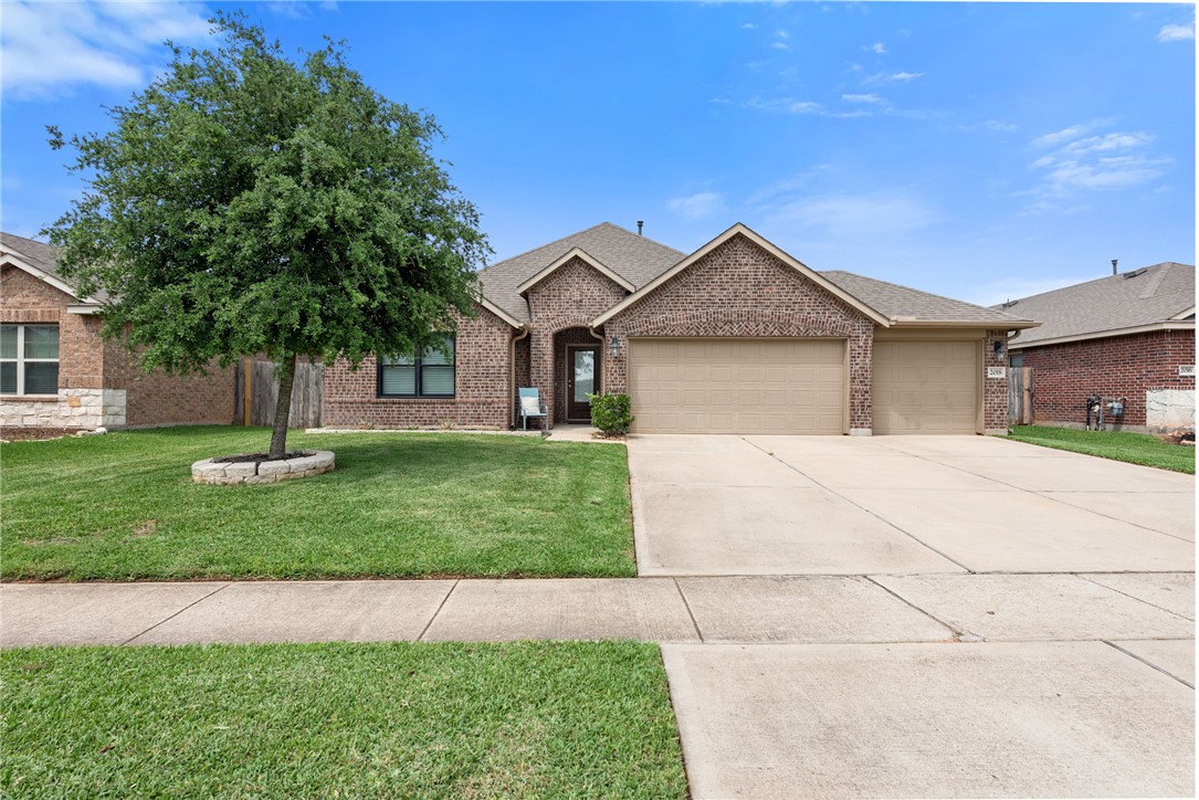 2018 Eagle View Drive Navasota, TX 77868 - Photo 1 of 28 a house with green field in front of it