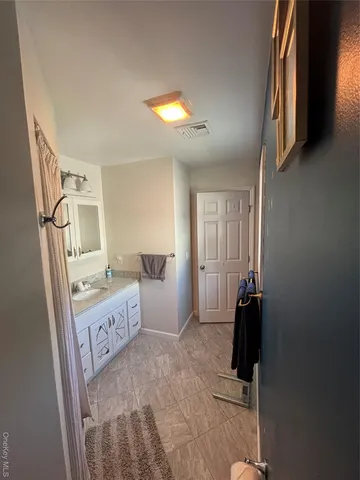 a room with furniture and a window