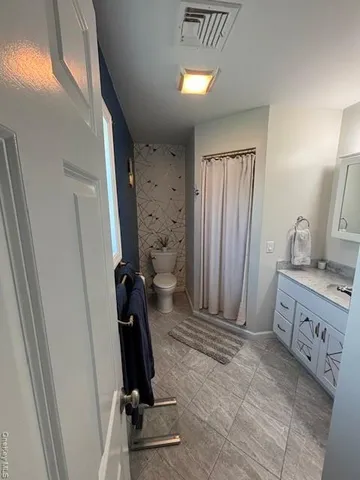 a view of a hallway with workspace