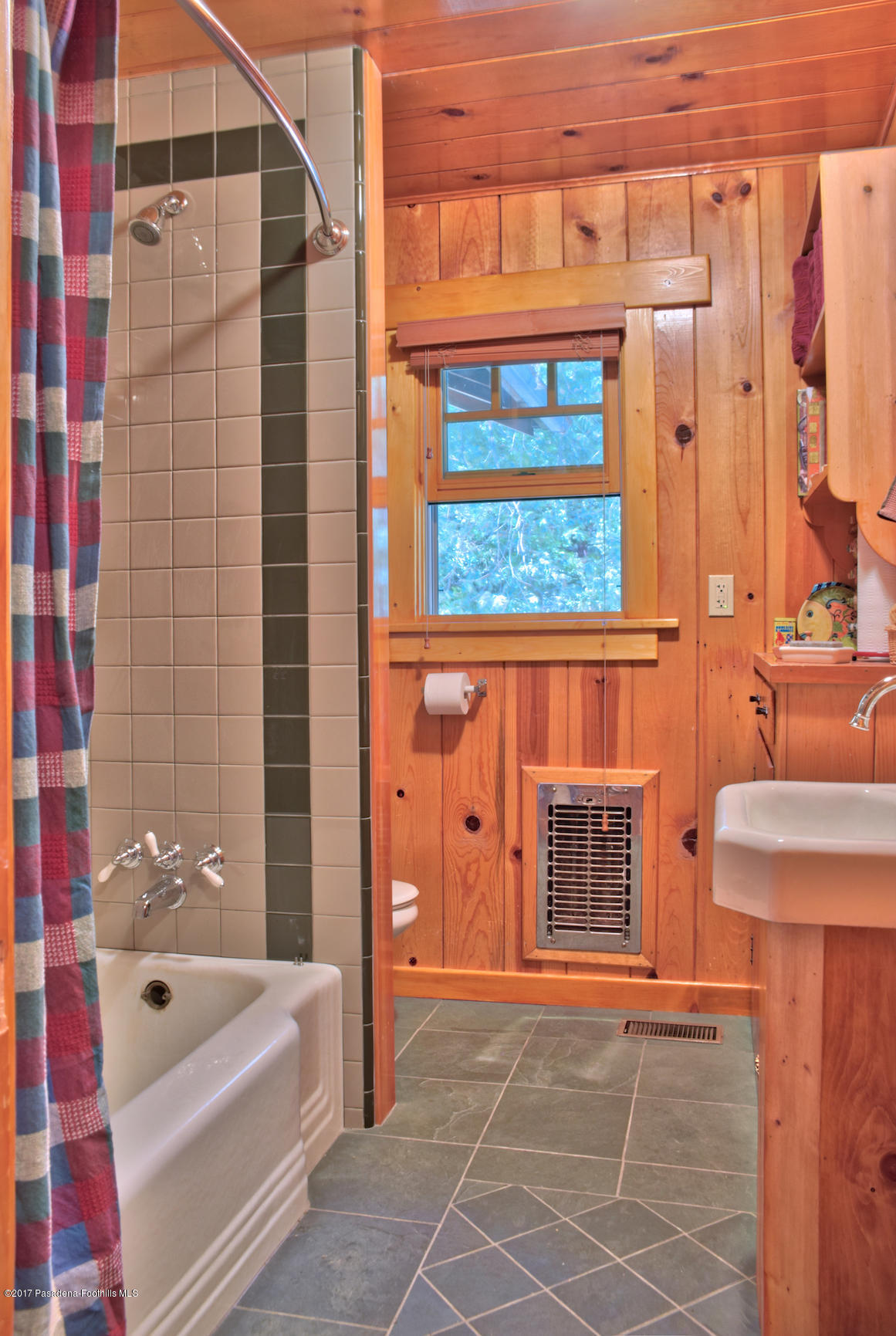 53225 Tollgate Road Idyllwild, CA 92549 - Photo 12 of 24 a bathroom with a bathtub and a shower