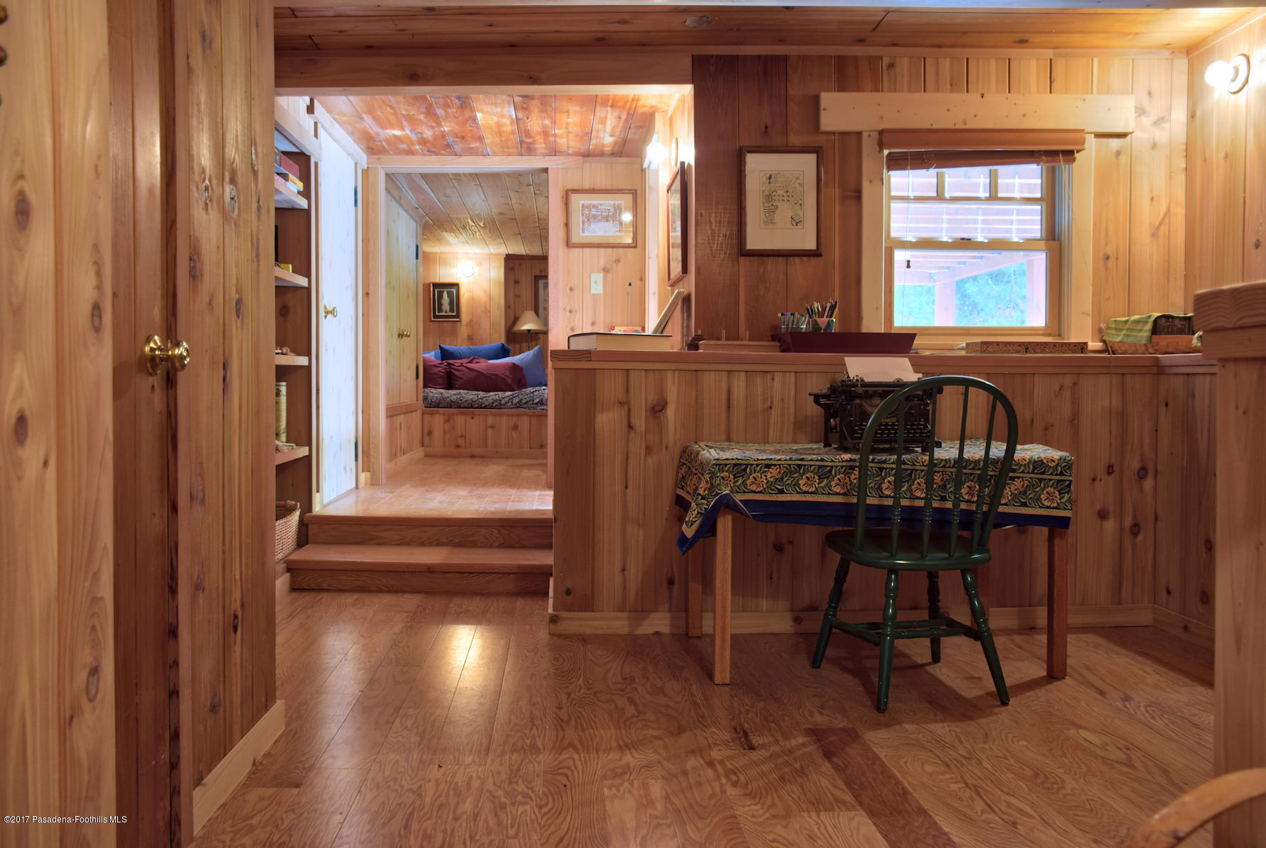 53225 Tollgate Road Idyllwild, CA 92549 - Photo 15 of 24 a living room with furniture and a large window