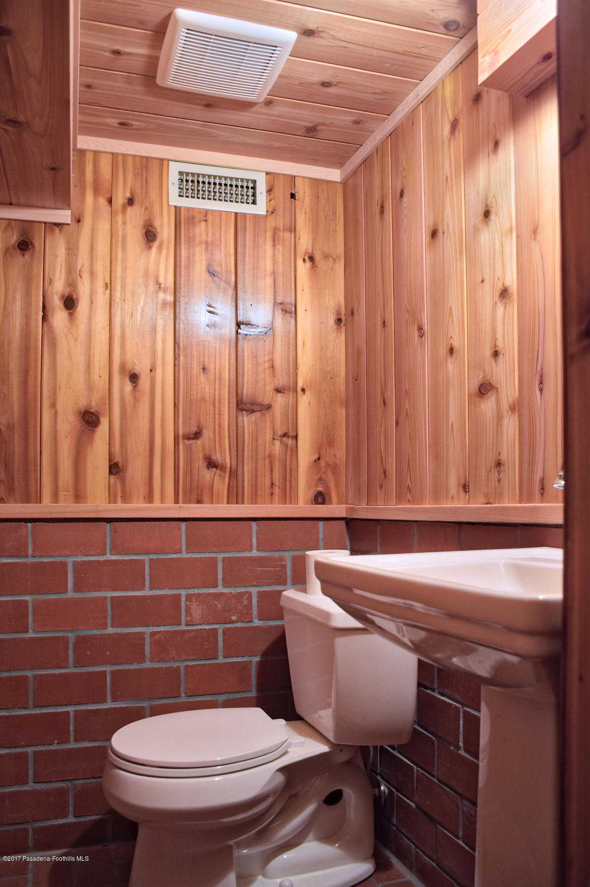 53225 Tollgate Road Idyllwild, CA 92549 - Photo 17 of 24 a bathroom with a toilet and a sink