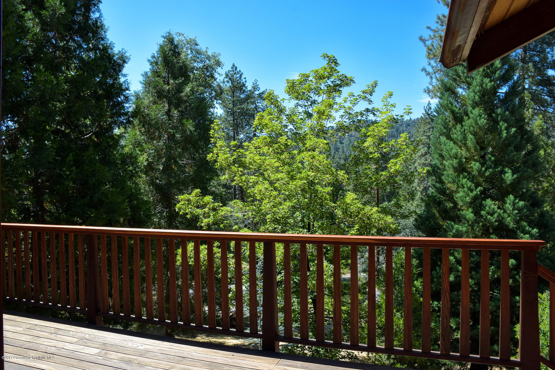 53225 Tollgate Road Idyllwild, CA 92549 - Photo 18 of 24 a balcony with wooden floor