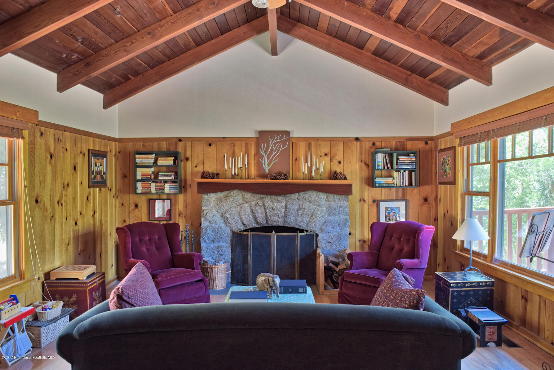 53225 Tollgate Road Idyllwild, CA 92549 - Photo 4 of 24 a living room with furniture fireplace and flat screen tv