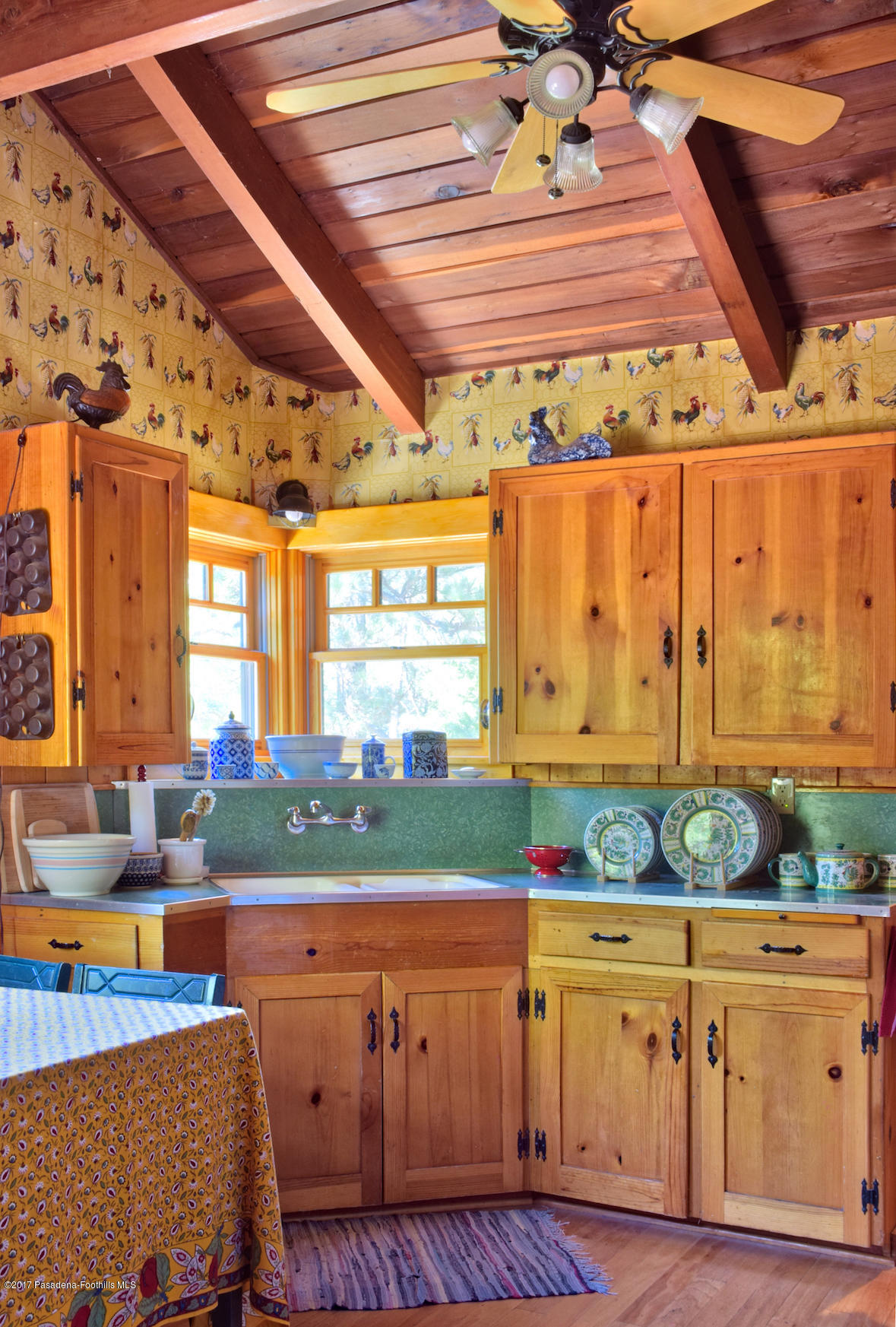 53225 Tollgate Road Idyllwild, CA 92549 - Photo 7 of 24 a kitchen with stainless steel appliances granite countertop a stove a sink and a refrigerator