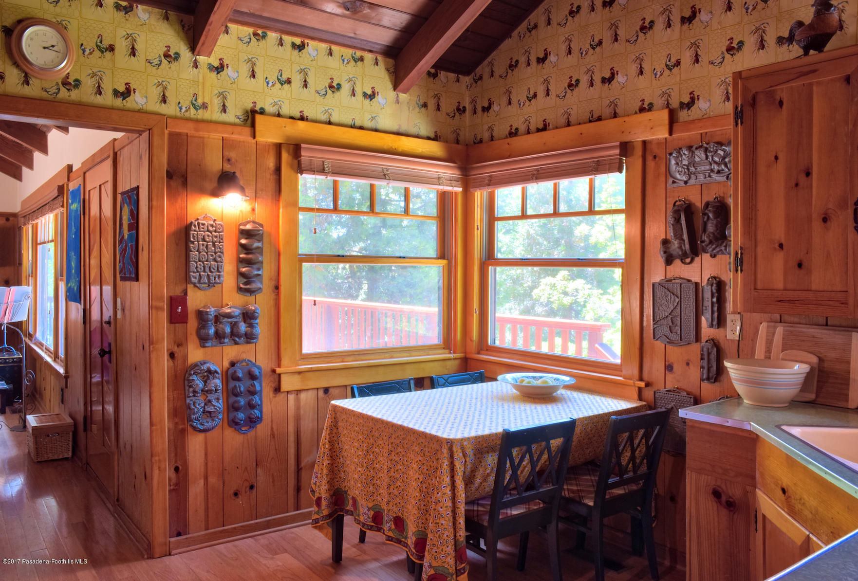 53225 Tollgate Road Idyllwild, CA 92549 - Photo 9 of 24 a dining room with a table and chairs