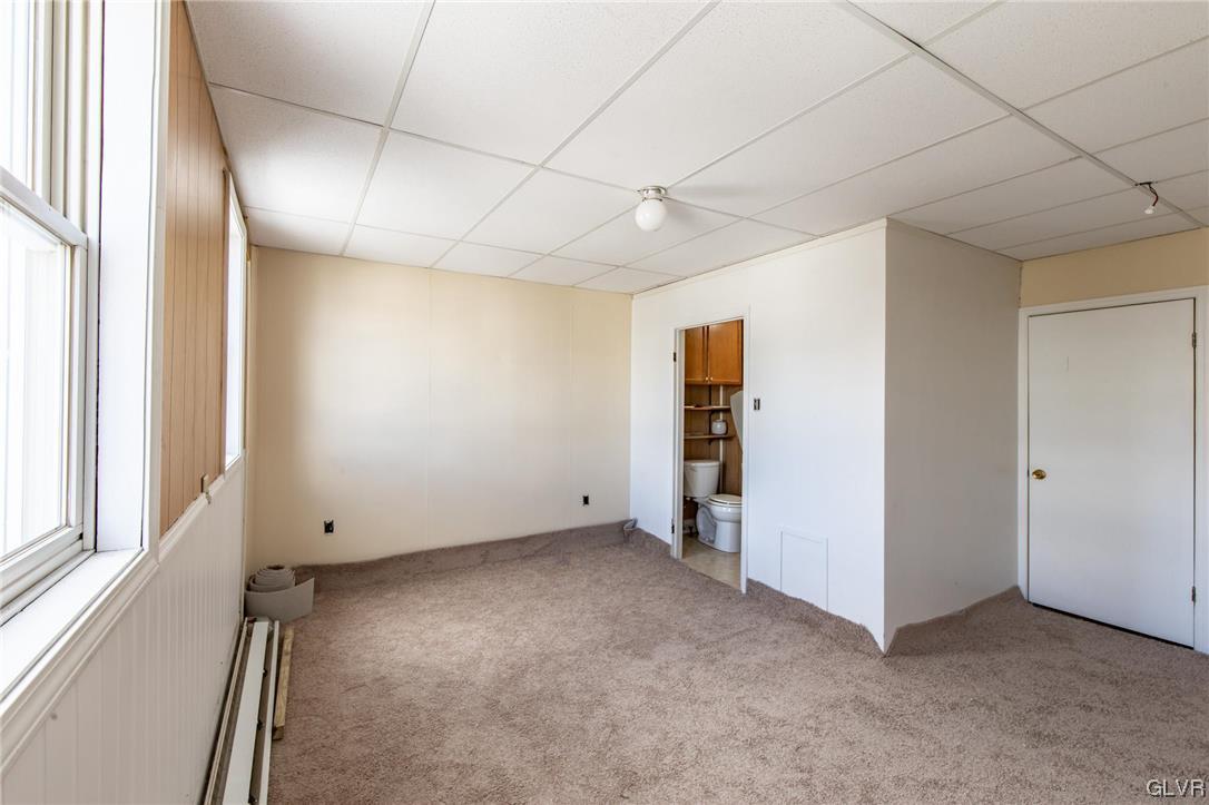 214 West Ridge Street Lansford, PA 18232 - Photo 11 of 26 a view of an empty room with a window