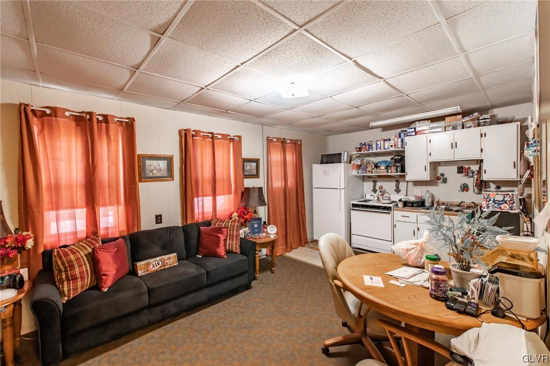 214 West Ridge Street Lansford, PA 18232 - Photo 3 of 26 a living room with furniture and large window