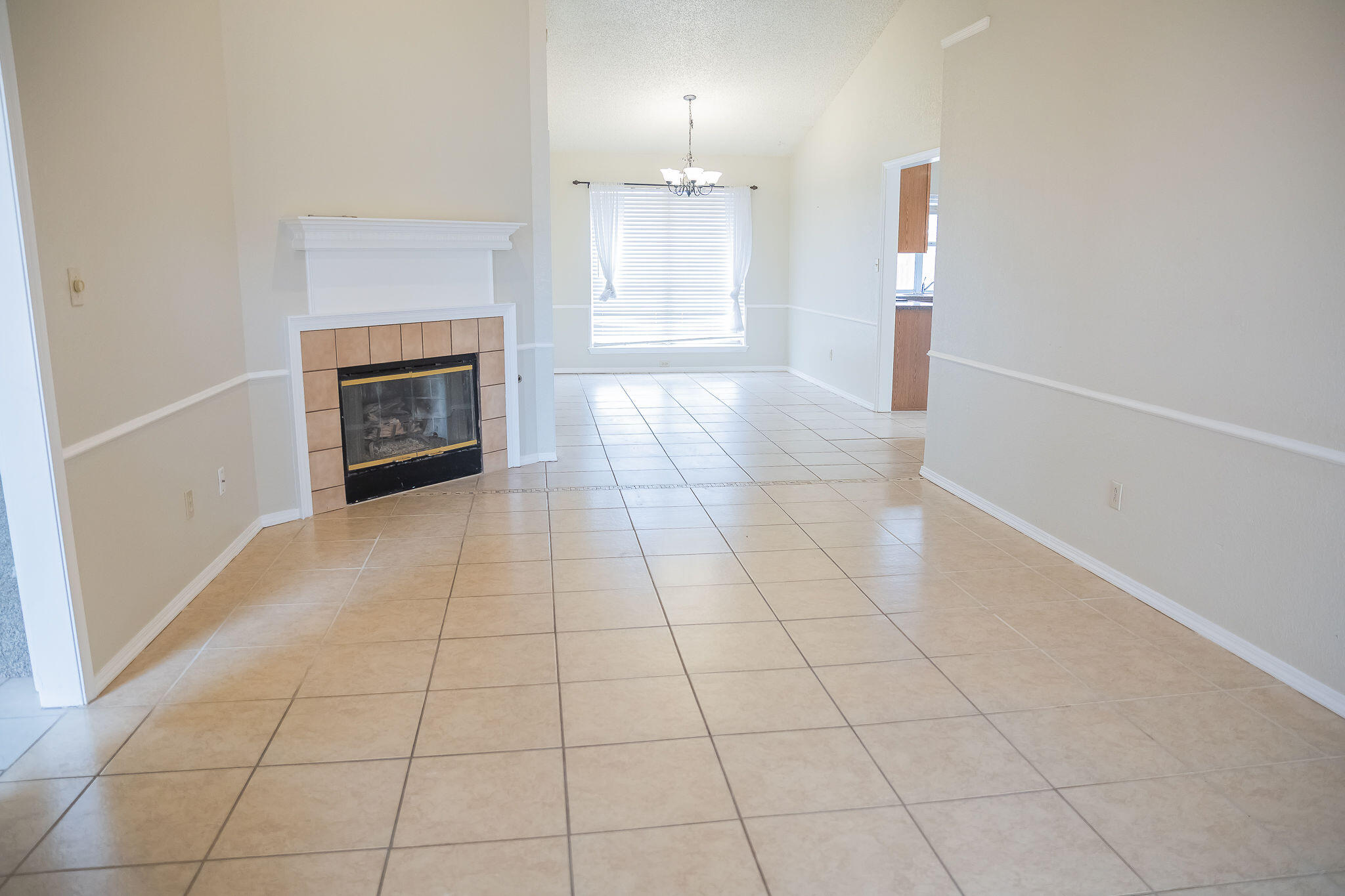 2120 93rd Street Lubbock, TX 79423 - Photo 7 of 32 a view of a livingroom with a fireplace