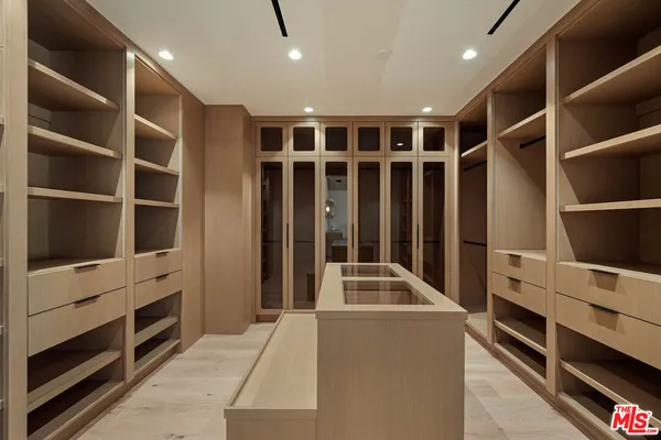 a room with furniture and white walls