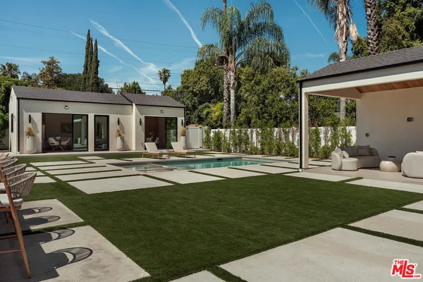 a view of a house with a swimming pool