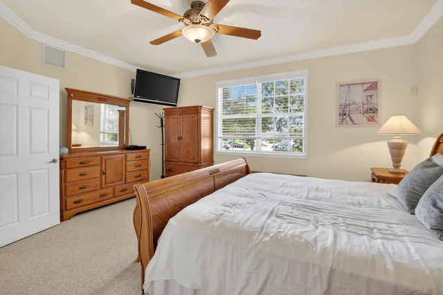 a en suite bathroom with a double vanity sink a mirror and a shower