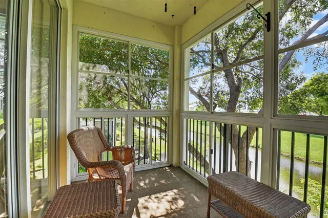a view of a porch with furniture