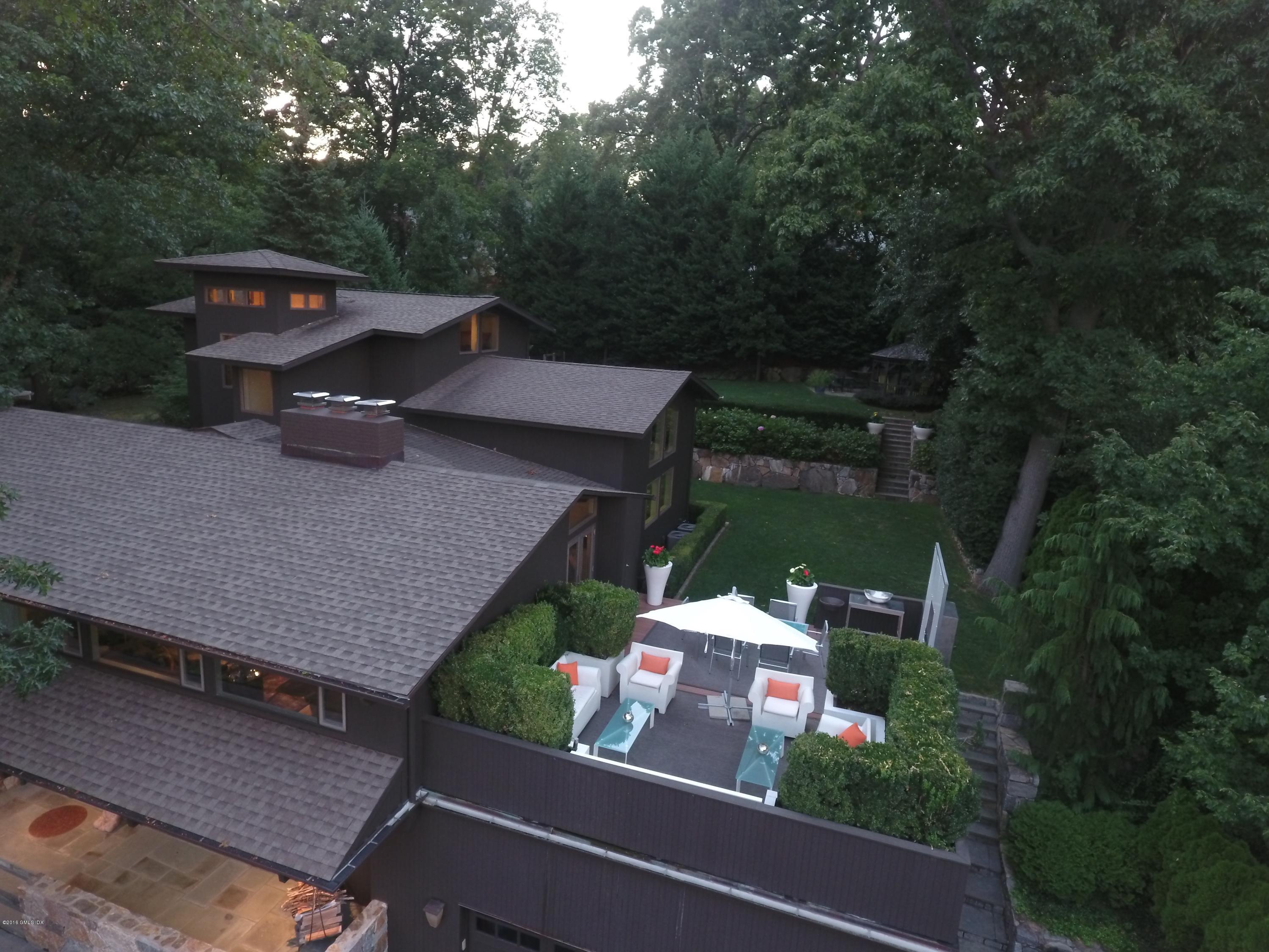 62 Arch Street Riverside, CT 06878 - Photo 14 of 16 an aerial view of a house with yard swimming pool and outdoor seating