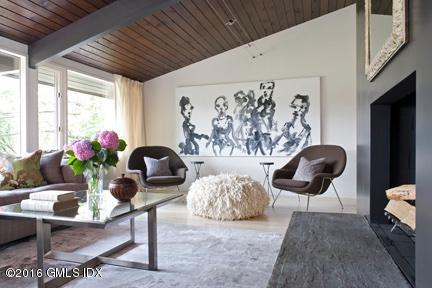 62 Arch Street Riverside, CT 06878 - Photo 4 of 16 a living room with furniture potted plant and a large window