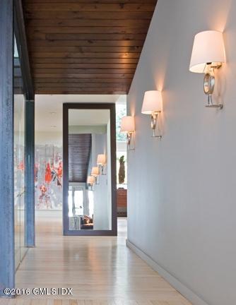 62 Arch Street Riverside, CT 06878 - Photo 9 of 16 a view of a hallway view with staircase