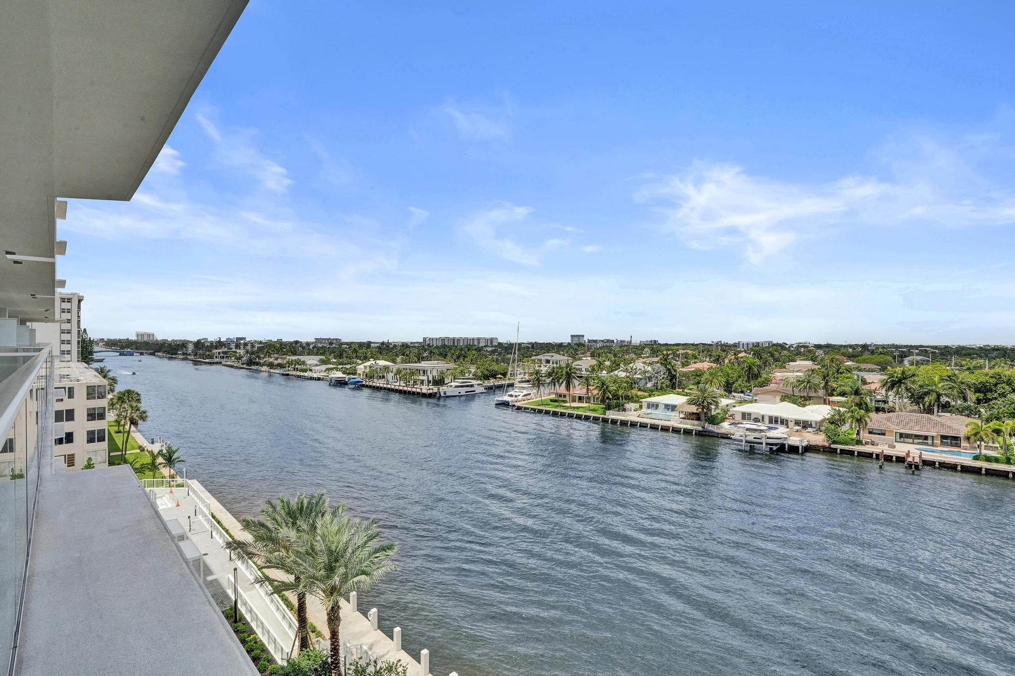 407 North Riverside Drive, Unit 605 Pompano Beach, FL 33062 - Photo 48 of 93 a view of a terrace with wooden floor and lake view