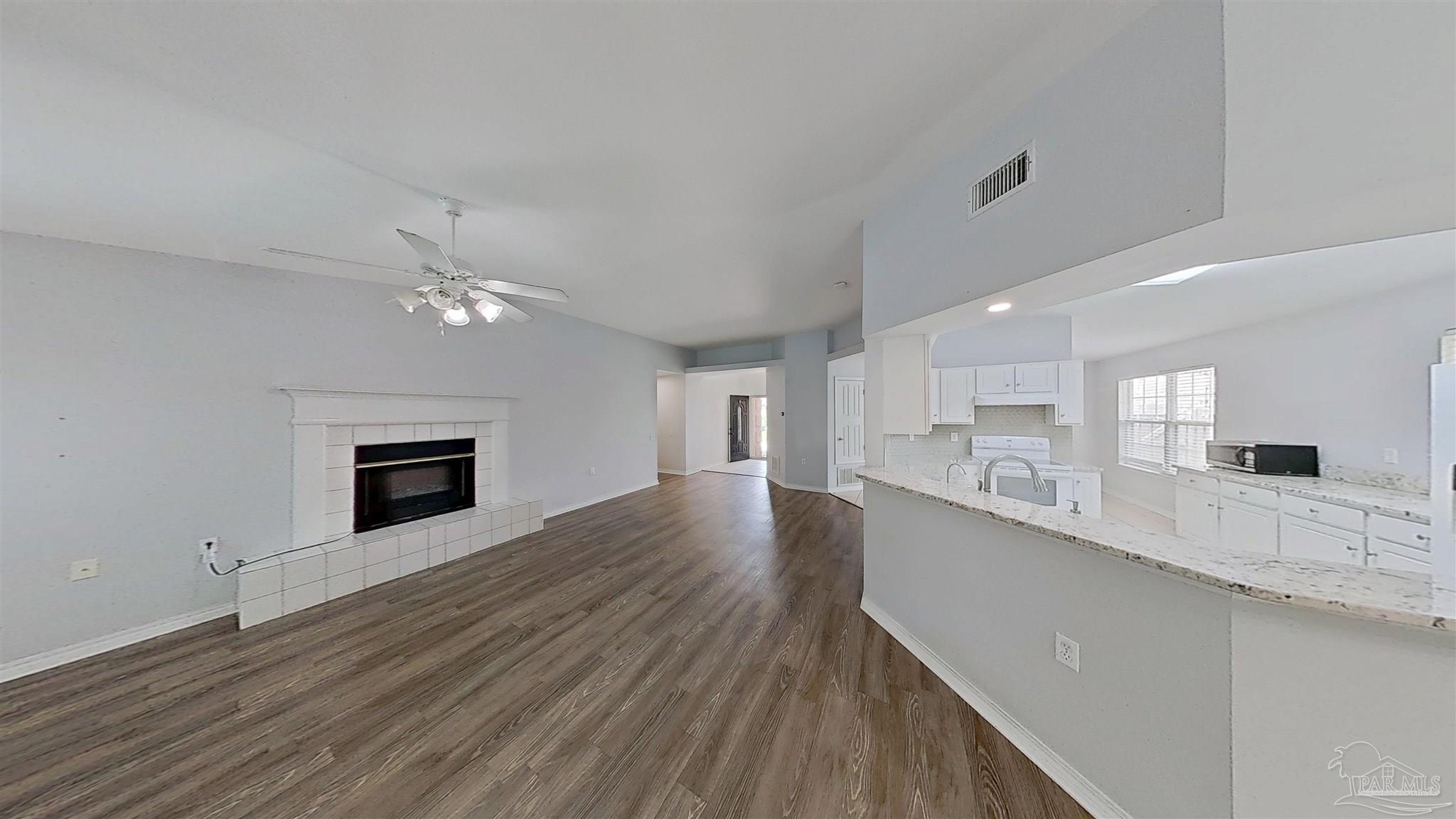 1039 Brownfield Road Pensacola, FL 32526 - Photo 2 of 14 a large kitchen with lot of counter top space and stainless steel appliances