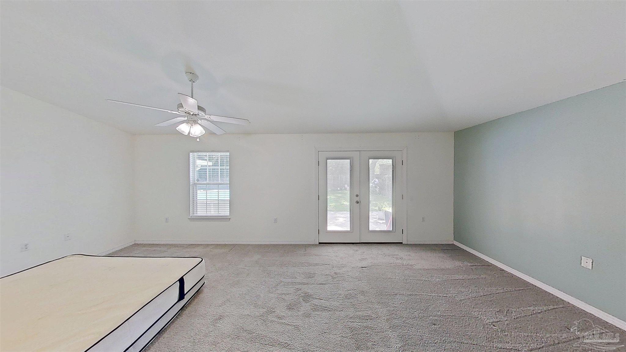 1039 Brownfield Road Pensacola, FL 32526 - Photo 7 of 14 an empty room with windows