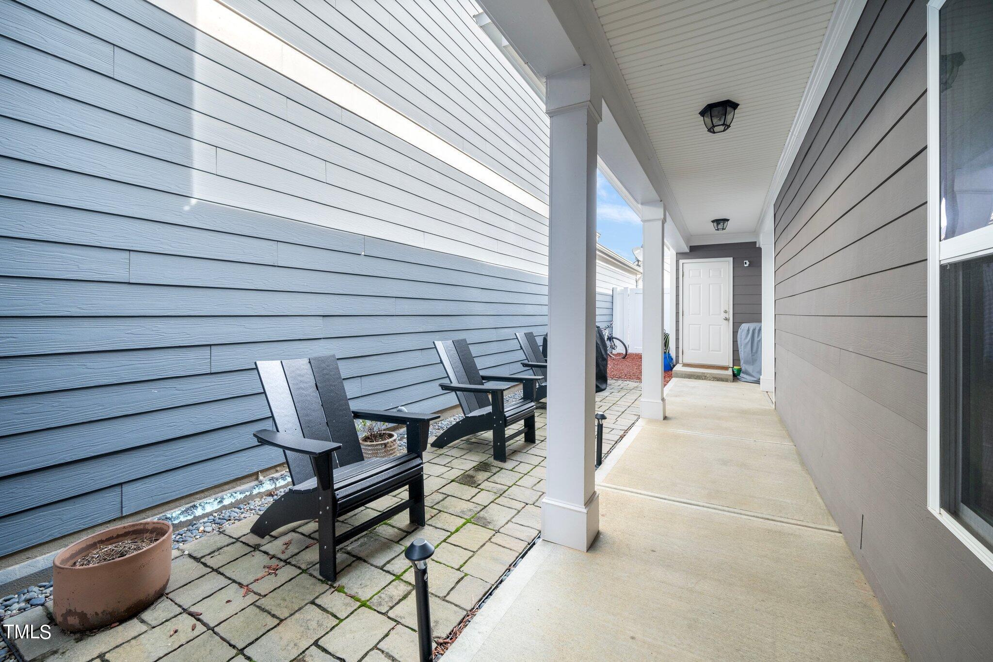 903 Ambergate Station Apex, NC 27502 - Photo 22 of 24 a view of a bench in wooden floor
