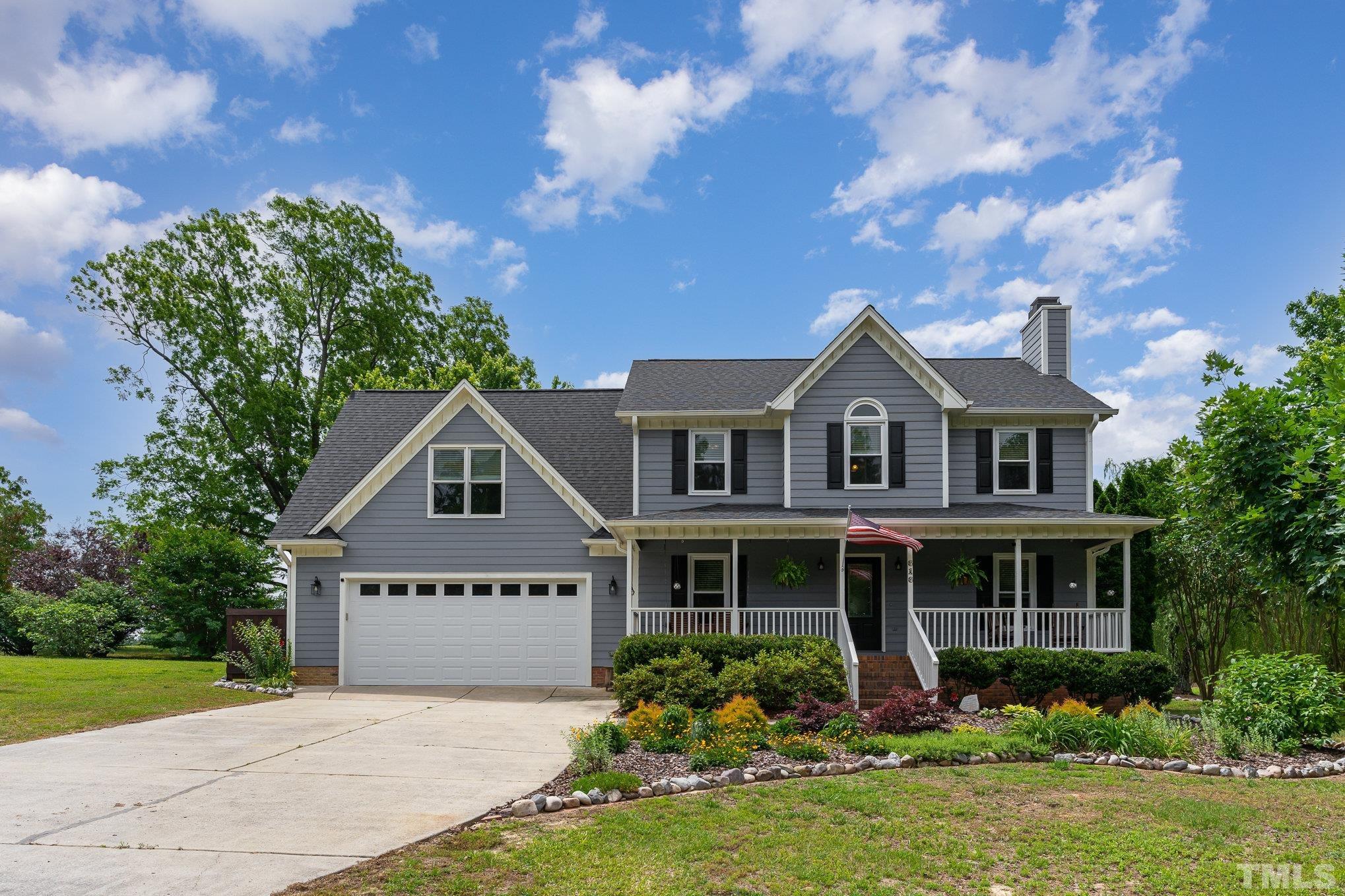 616 Jordan Ridge Lane Raleigh, NC 27603 - Photo 1 of 31 a front view of house with yard and green space